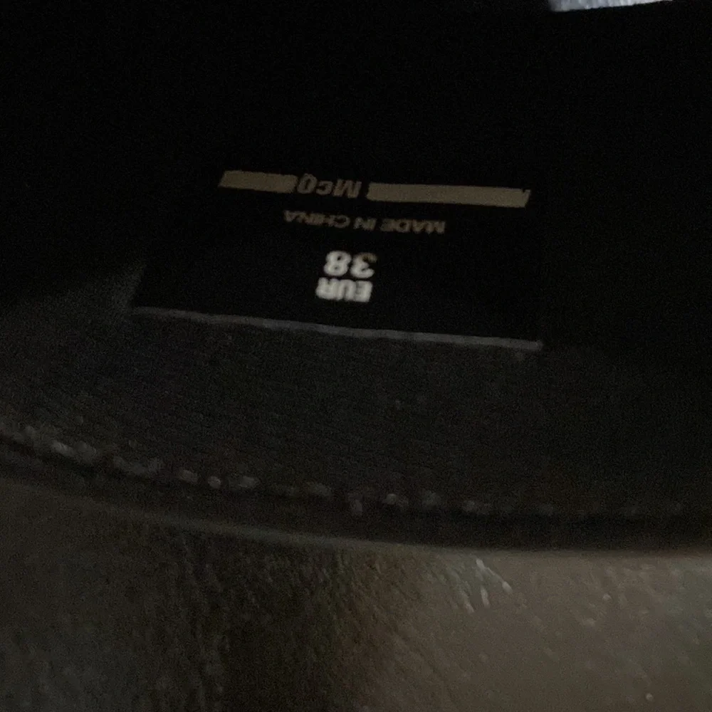 MCQ logo slides (all black)